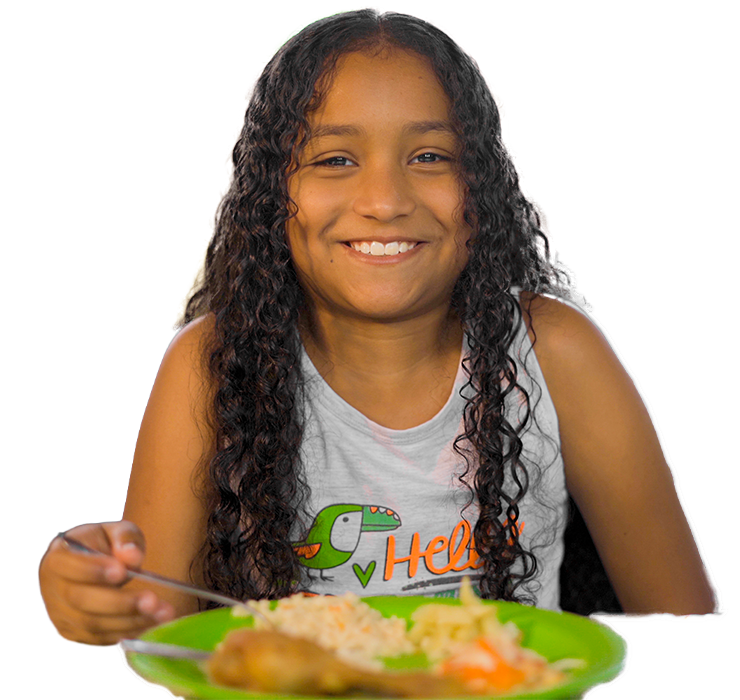 Niña-comiendo-en-comedor-comunitario-beneficiario-de-los-bancos-de-alimentos-ABACO